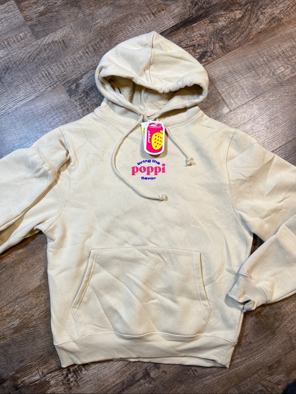 poppi cream hoodie with pink logo